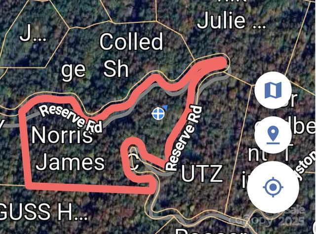 a view of a town with mountains in the background