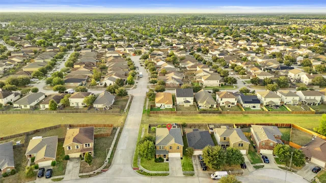 an aerial view of residential building with an ocean view