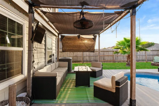 a view of a garden with patio