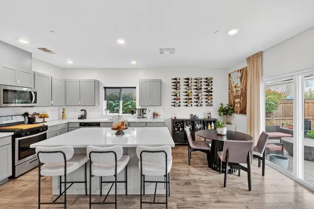 a view of a dining room with furniture window and outside view