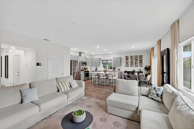 a living room with furniture and a table