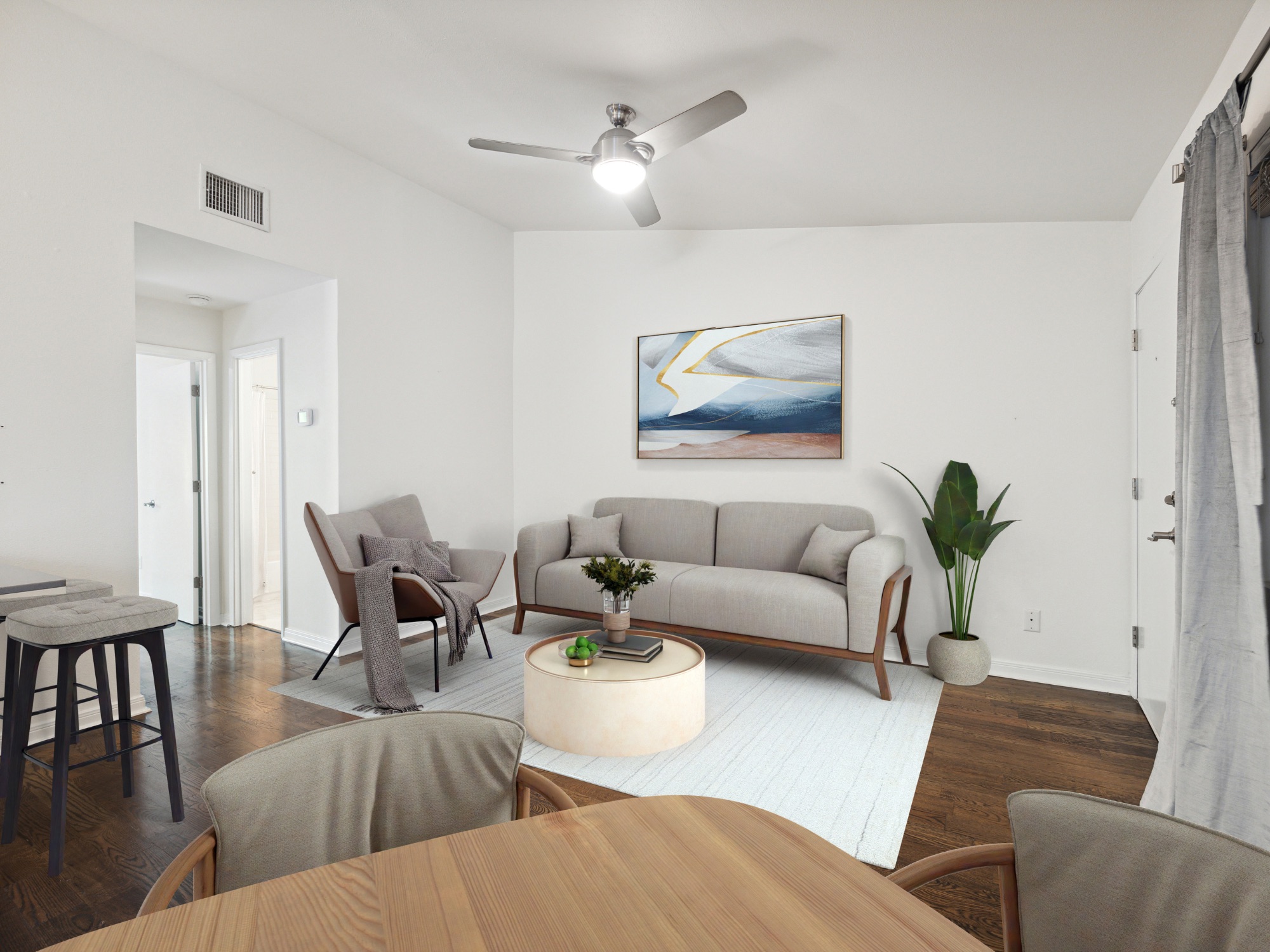 1503 West 9th Street, Unit 204 Austin, TX 78703 - Photo 6 of 21 Open-concept living space with dark wood-finish flooring