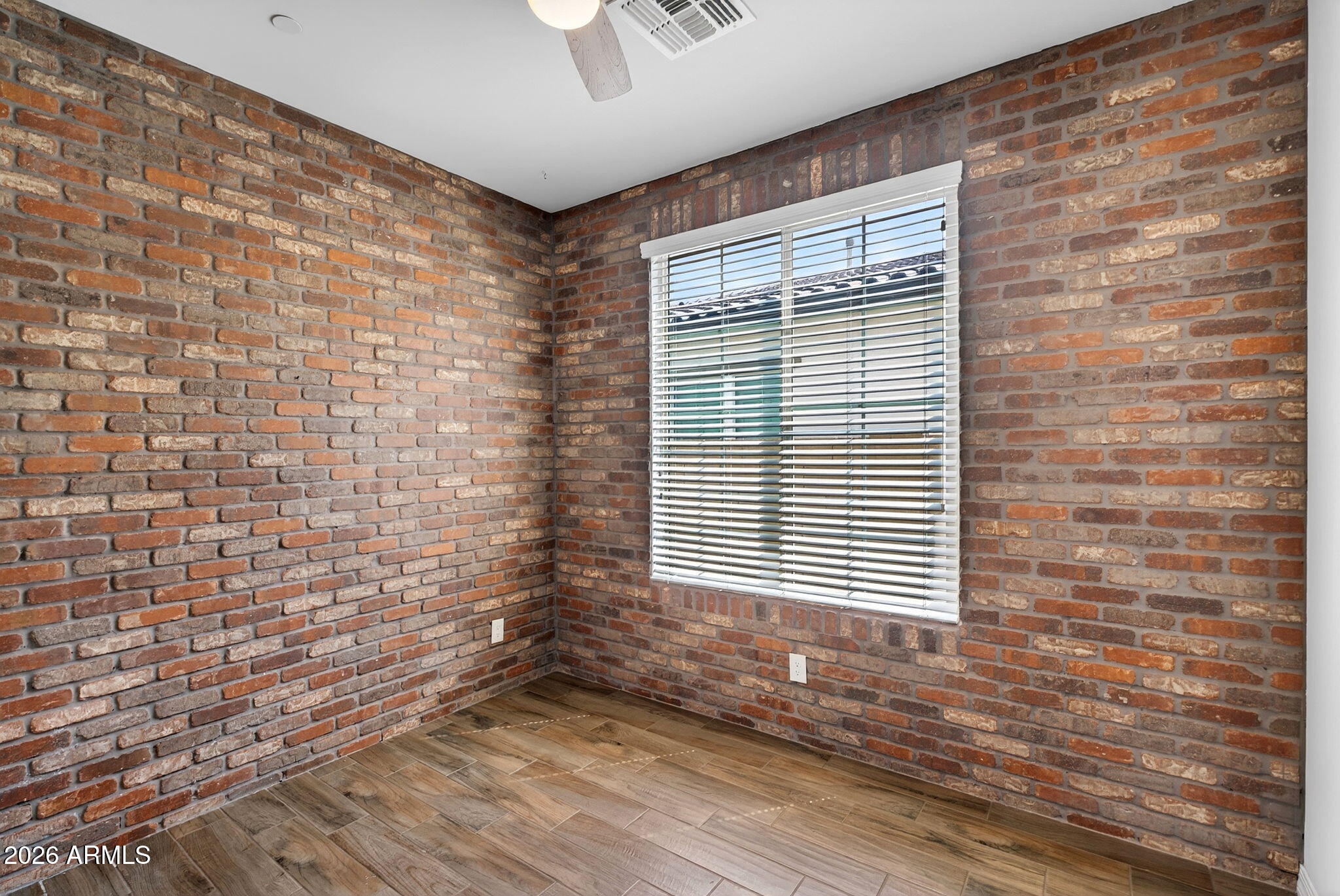 12124 West Peak View Road Peoria, AZ 85383 - Photo 13 of 38 a view of a room that has a window in it