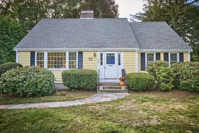 front view of a house with a yard