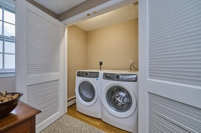 a utility room with dryer and washer