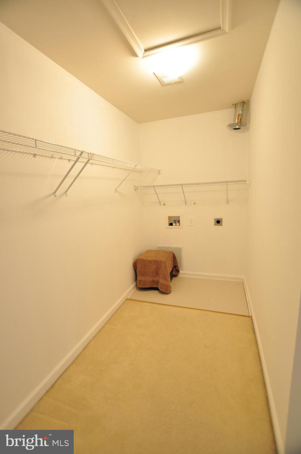 146 Riparian Lane Ranson, WV 25438 - Photo 21 of 42 Master bedroom closet w/optional laundry hookup!