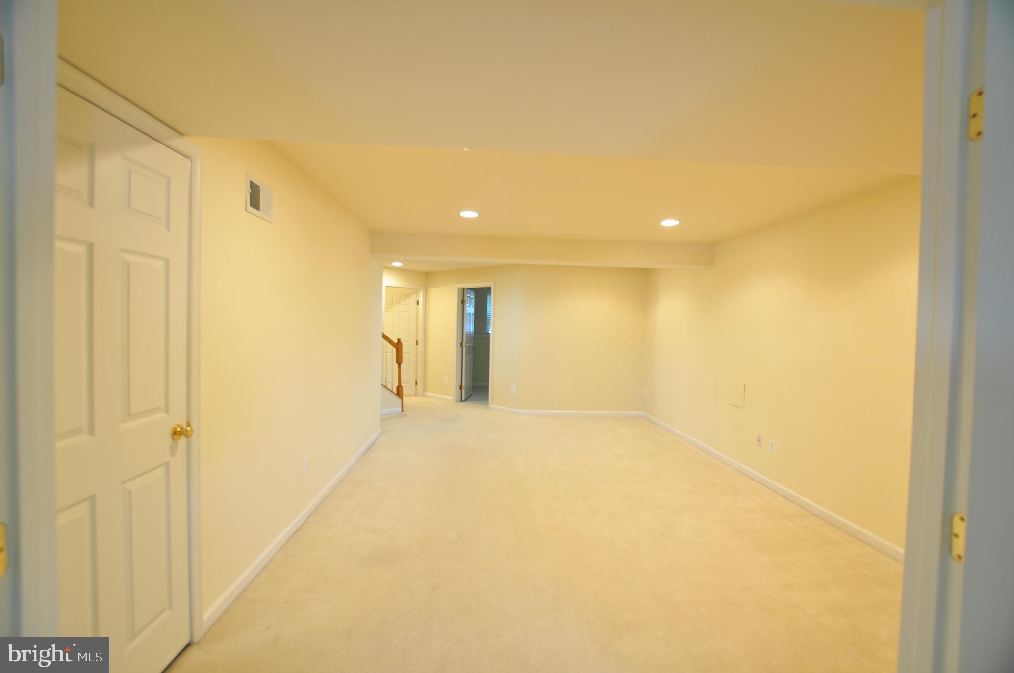 146 Riparian Lane Ranson, WV 25438 - Photo 33 of 42 Laundry/utility room off huge rec room!
