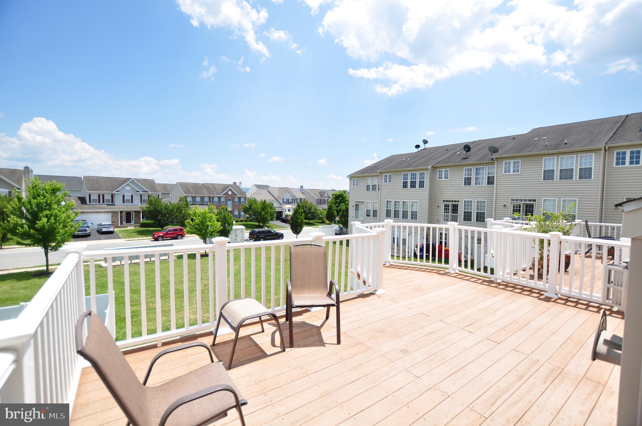 146 Riparian Lane Ranson, WV 25438 - Photo 36 of 42 Huge deck off main level family room!