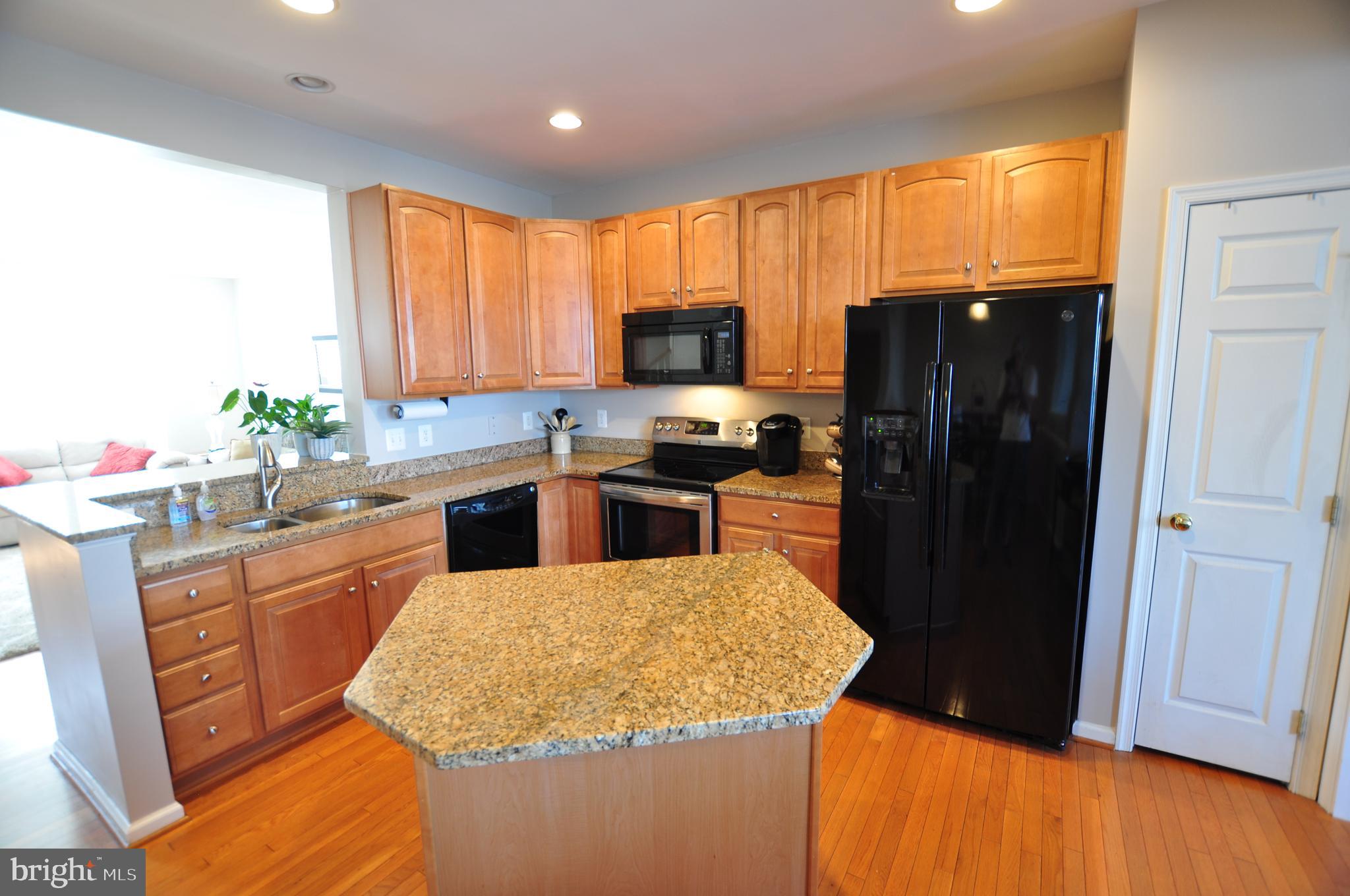 146 Riparian Lane Ranson, WV 25438 - Photo 8 of 42 Center island, pantry, and updated appliances!