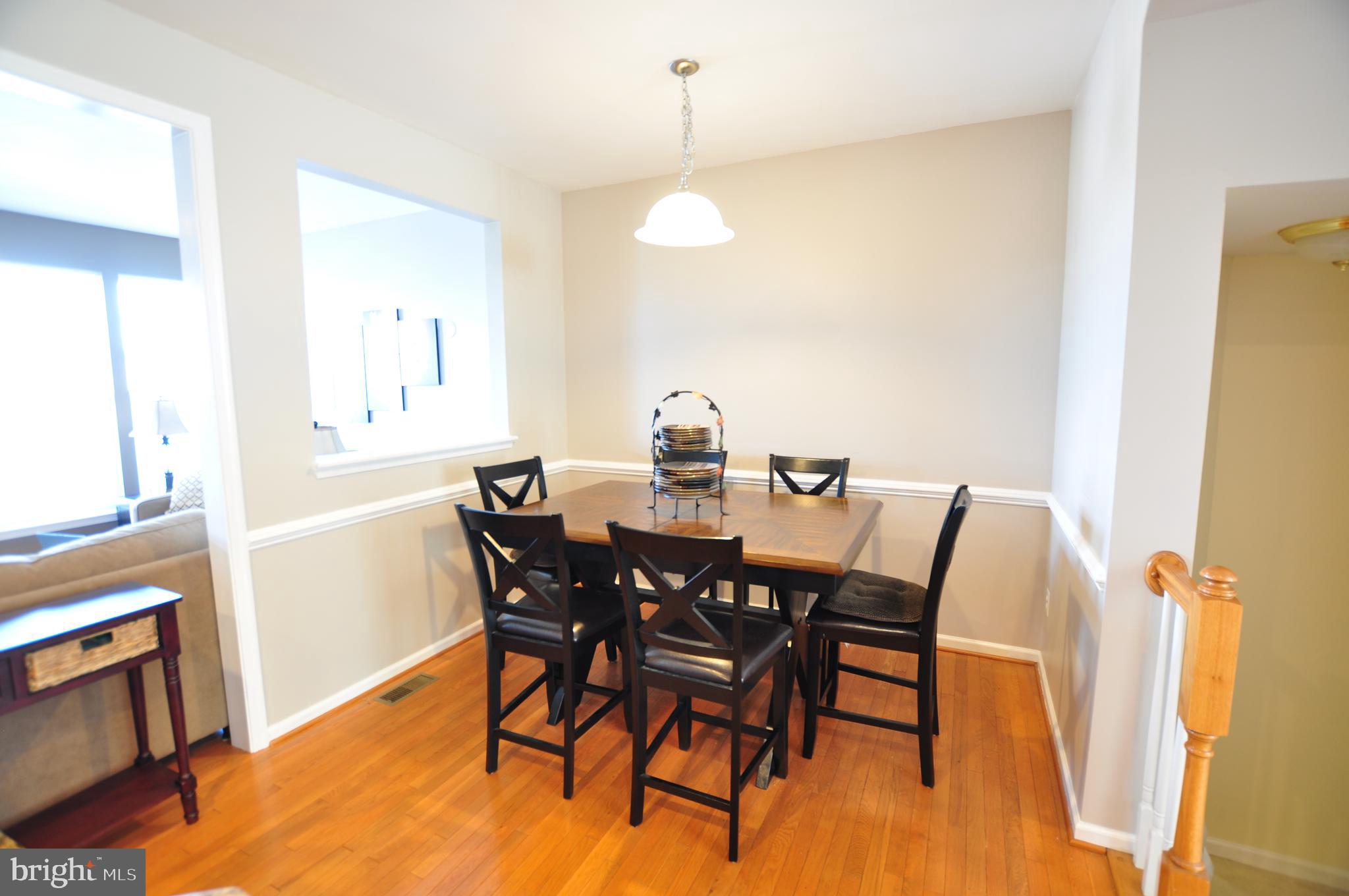 146 Riparian Lane Ranson, WV 25438 - Photo 9 of 42 Dining area with chair rail!
