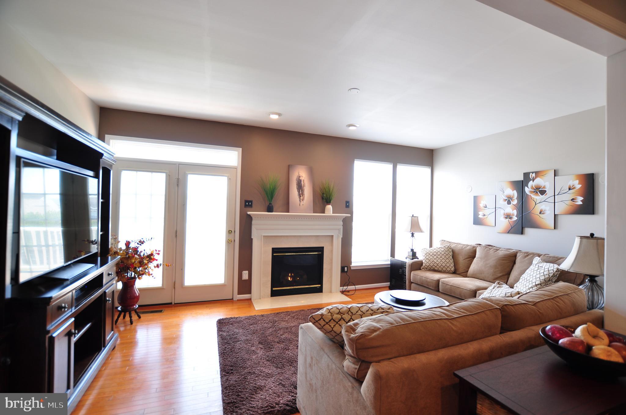 146 Riparian Lane Ranson, WV 25438 - Photo 10 of 42 Large family room with rear deck access!