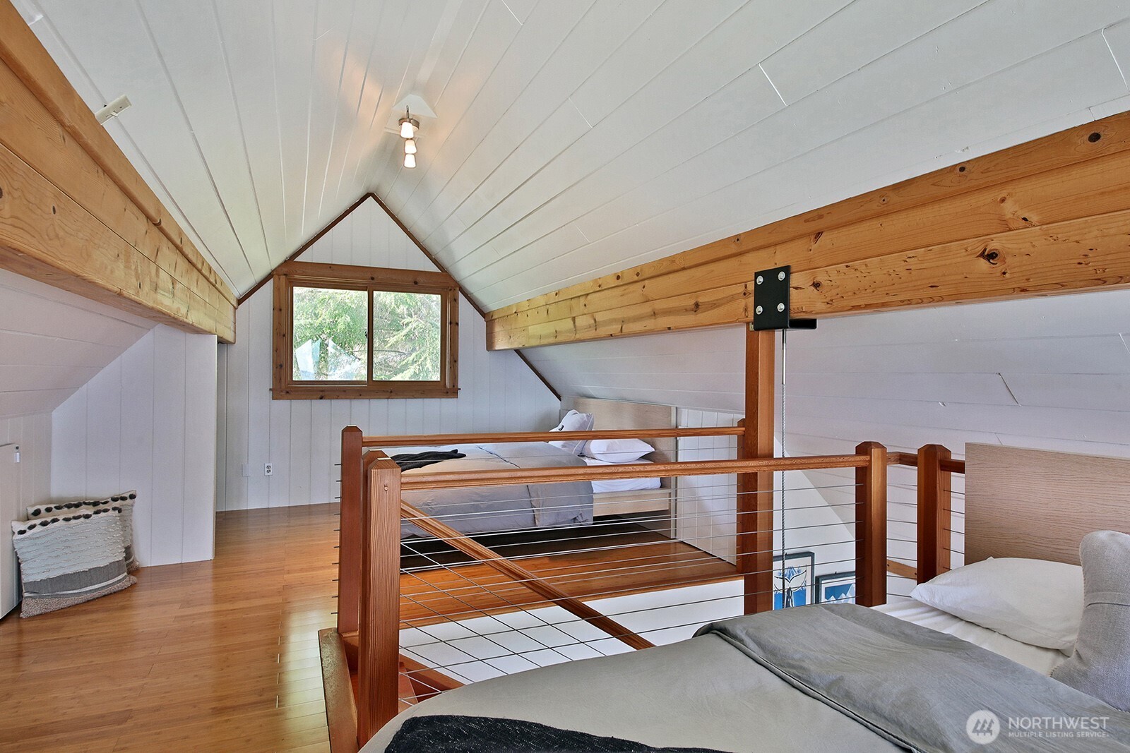 2282 East Whidbey Shores Road Langley, WA 98260 - Photo 18 of 38 a room with lots of furniture and a window