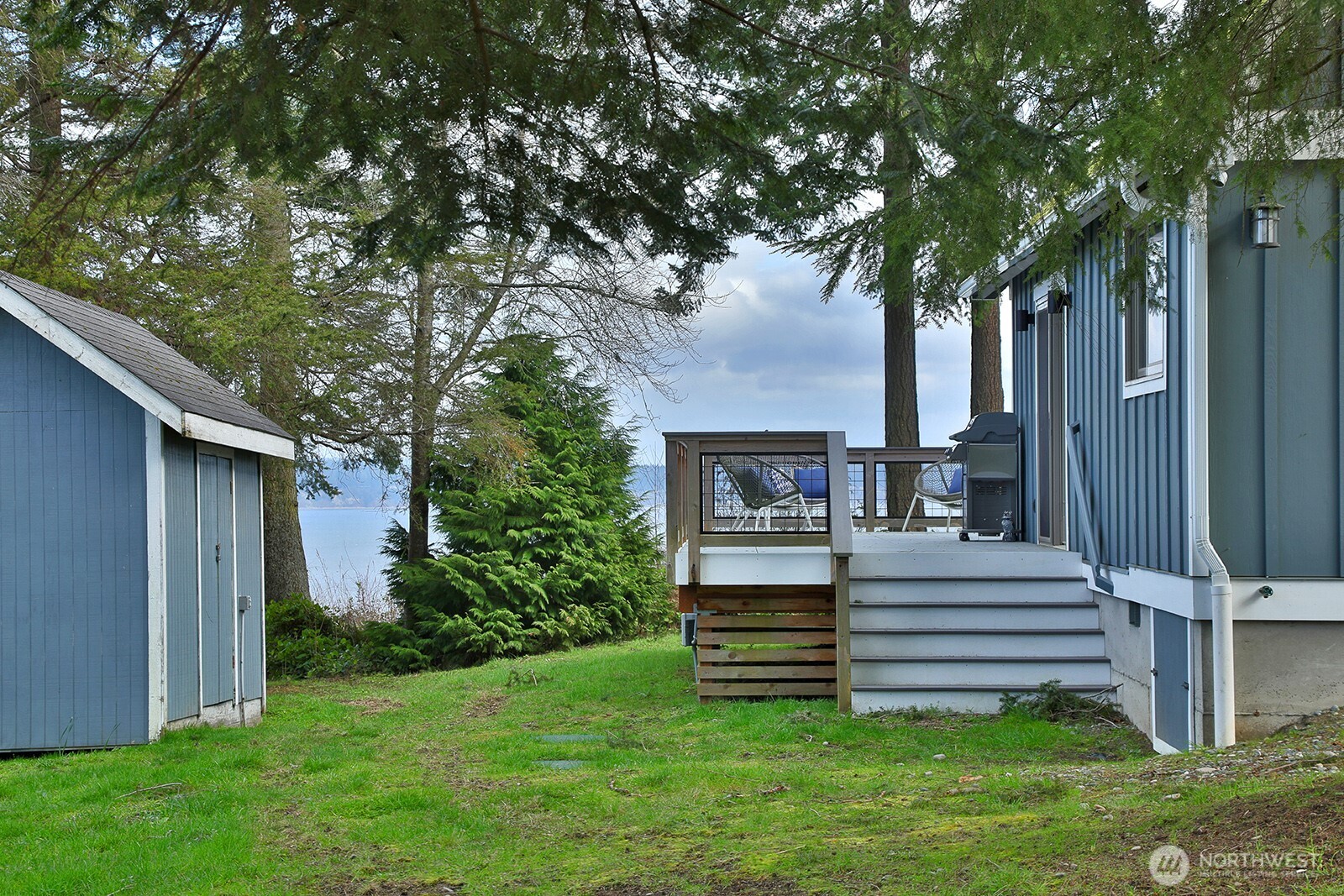 2282 East Whidbey Shores Road Langley, WA 98260 - Photo 23 of 38 a view of a house with a backyard