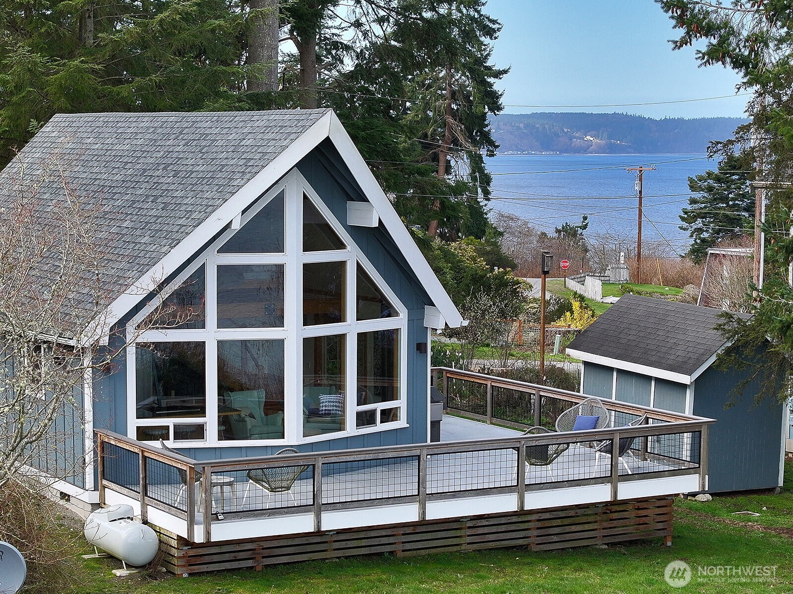 2282 East Whidbey Shores Road Langley, WA 98260 - Photo 27 of 38 a view of house and outdoor space with swimming pool
