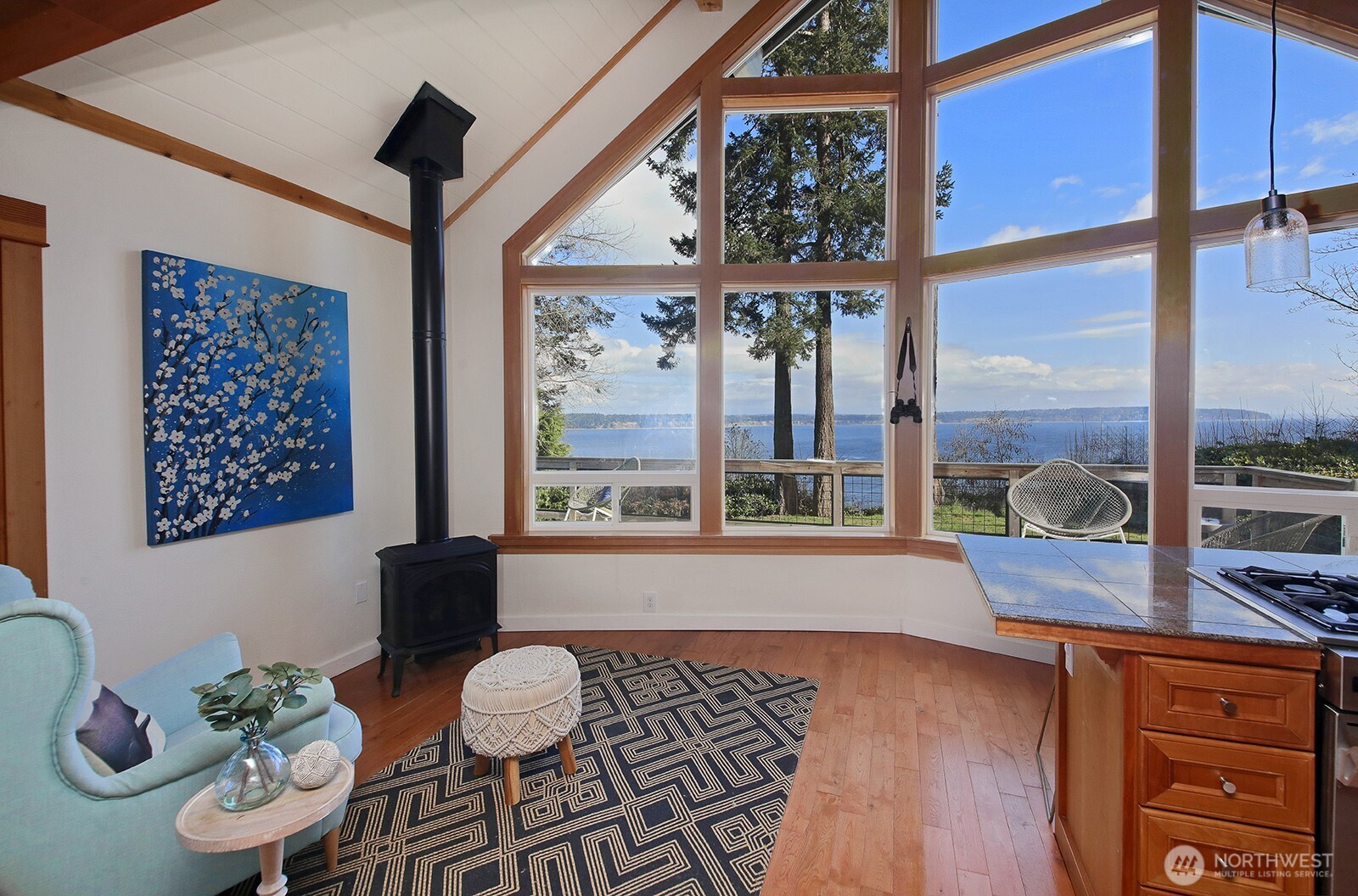 2282 East Whidbey Shores Road Langley, WA 98260 - Photo 4 of 38 a living room with furniture and a large window