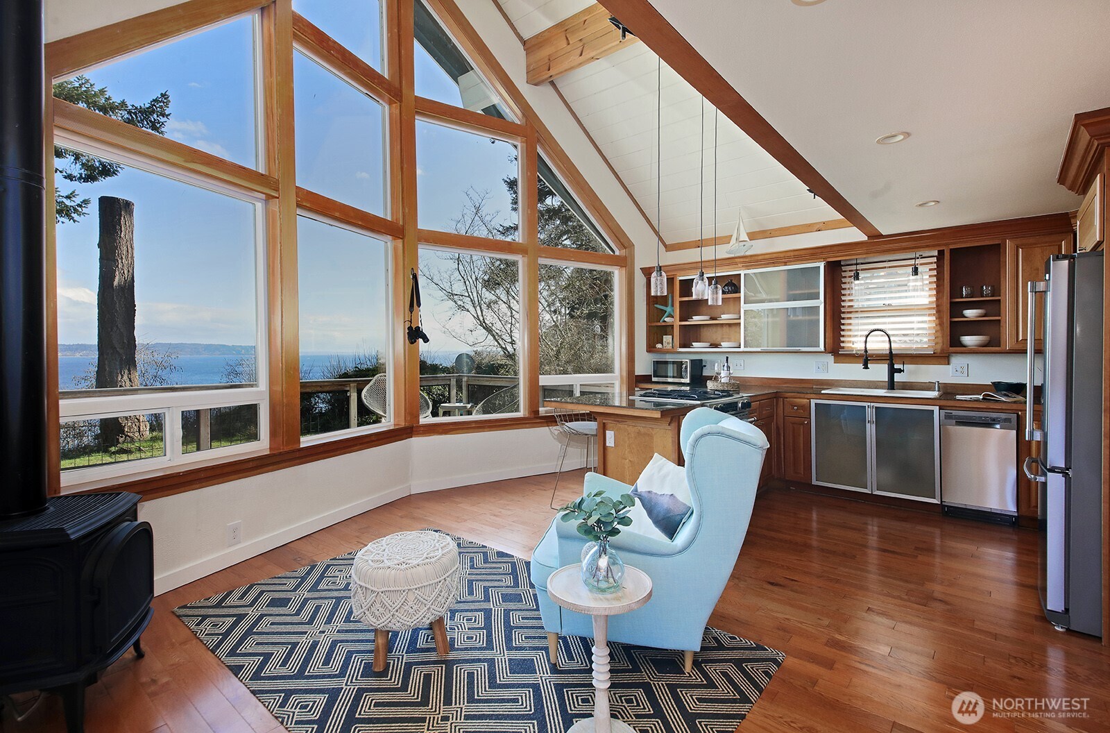 2282 East Whidbey Shores Road Langley, WA 98260 - Photo 5 of 38 a view of a dining room with furniture window and wooden floor
