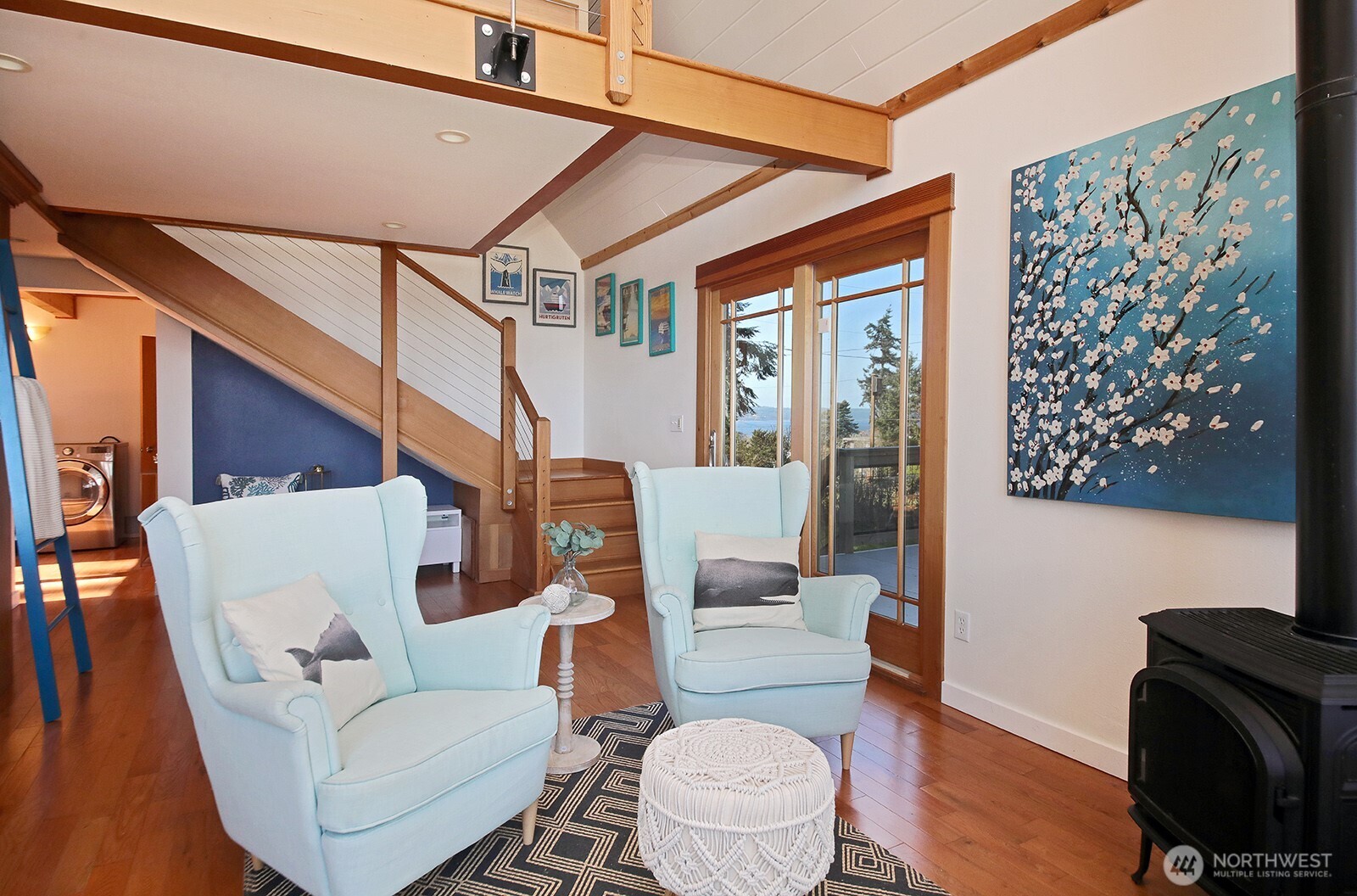 2282 East Whidbey Shores Road Langley, WA 98260 - Photo 6 of 38 a living room with furniture and a potted plant