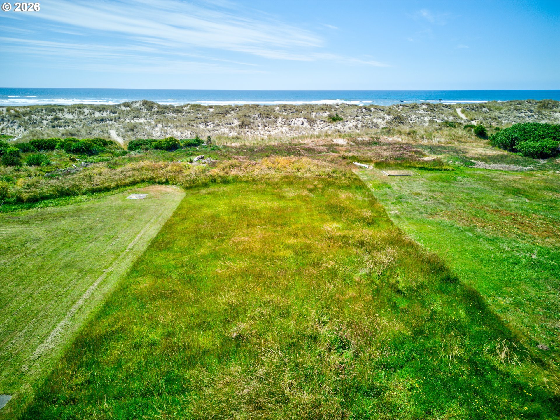 3446 Beach Loop Road Bandon, OR 97411 - Photo 6 of 7 a view of an ocean from a big room