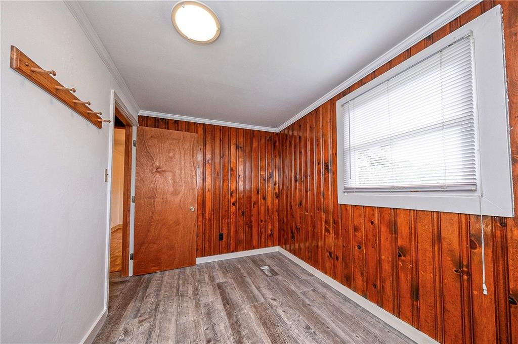 531 Laughlin Avenue Pittsburgh, PA 15210 - Photo 14 of 35 a view of a room with wooden floor and windows