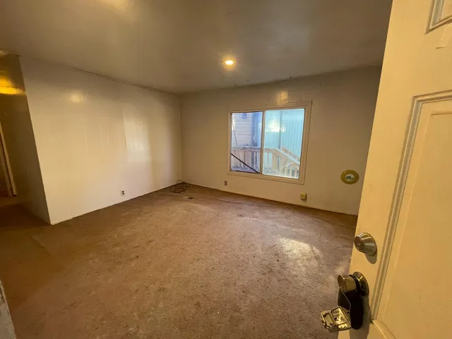 an empty room with windows