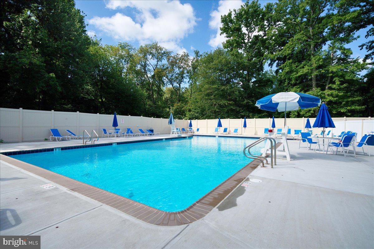28 Holly Court Hamilton, NJ 08619 - Photo 24 of 29 swimming pool view with a outdoor seating