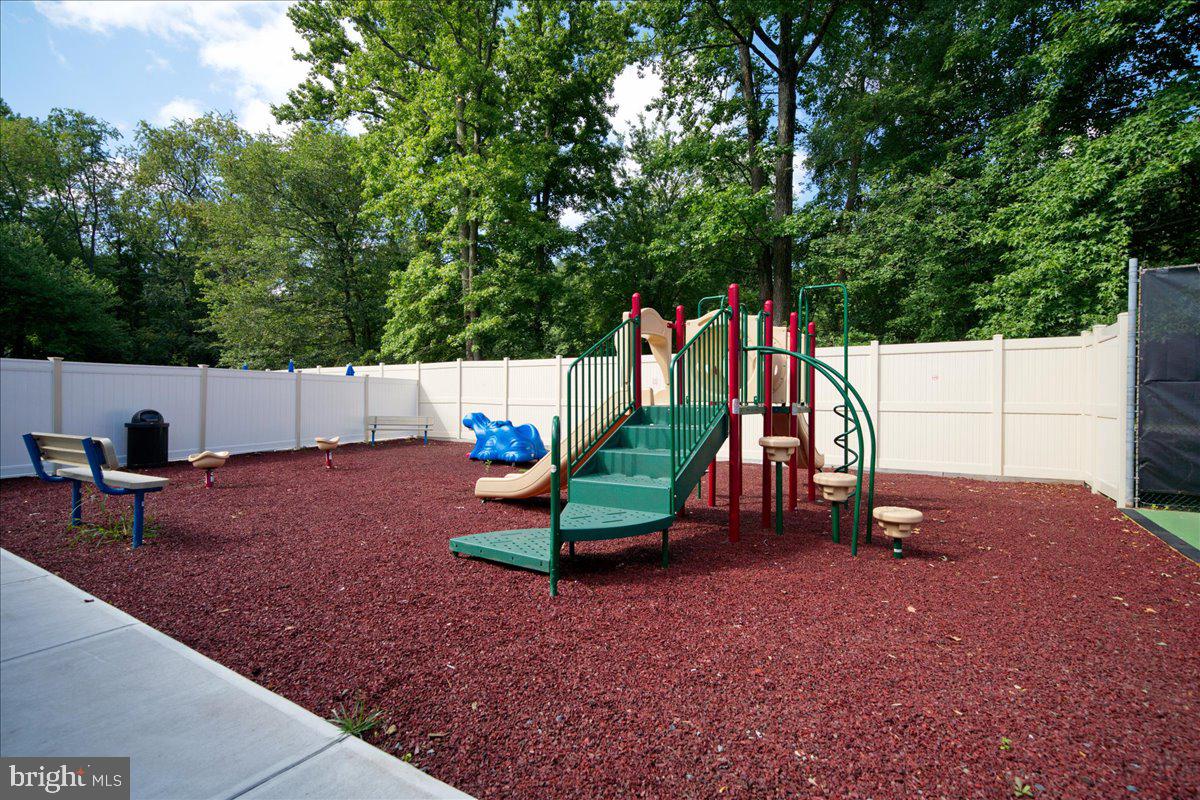 28 Holly Court Hamilton, NJ 08619 - Photo 25 of 29 a view of a park with slide