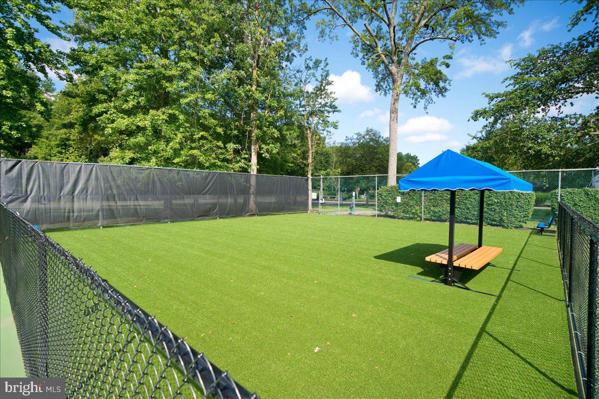 28 Holly Court Hamilton, NJ 08619 - Photo 29 of 29 a swimming pool with an outdoor seating and yard