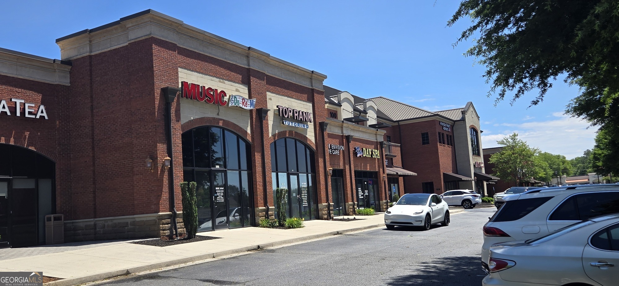 10475 Medlock Bridge Road, Unit 900 Duluth, GA 30097 - Photo 12 of 13 a view of a building along with street