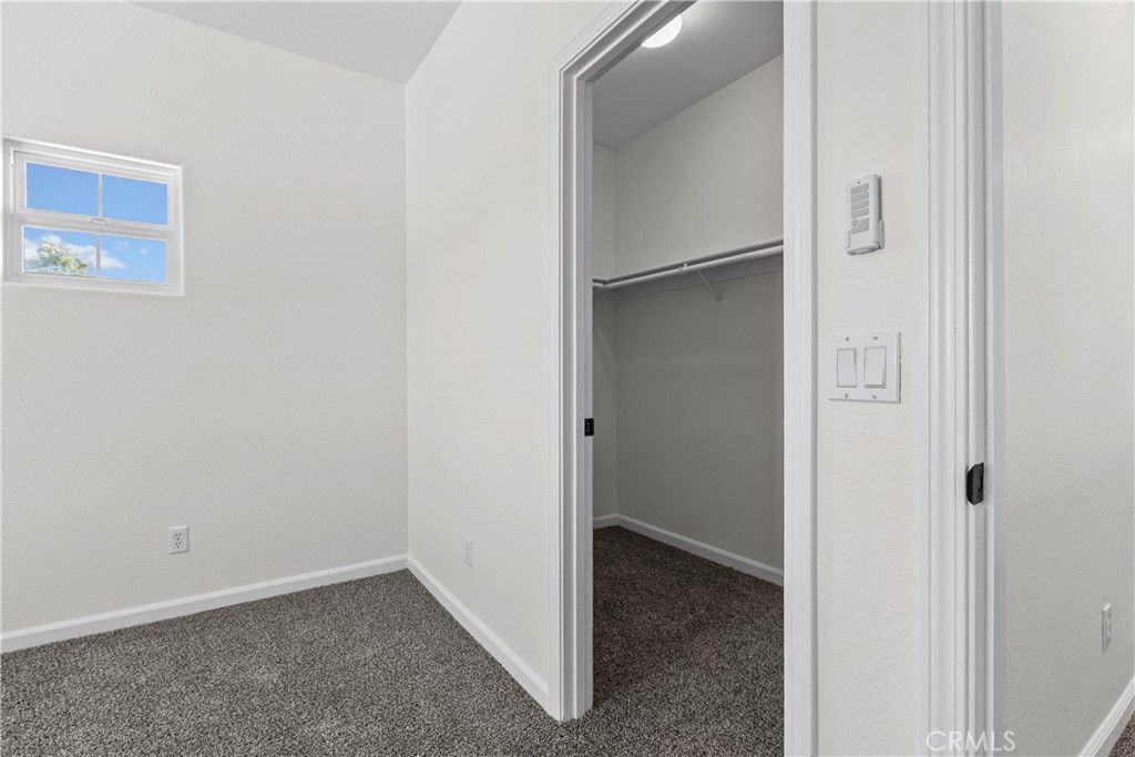 924 Riata Court Paso Robles, CA 93446 - Photo 23 of 46 Guest Bedroom 1 with large walk-in closet