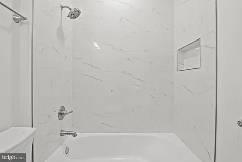 an empty room with an entryway