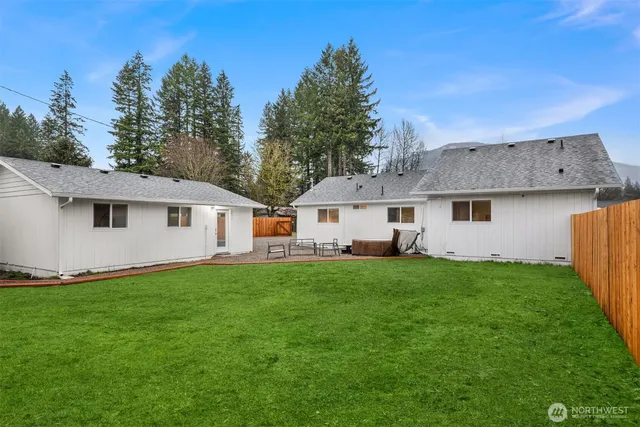 a front view of a house with yard