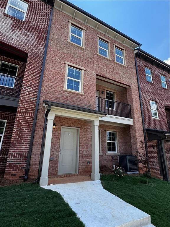 1777 Temple Avenue, Unit N Atlanta, GA 30337 - Photo 10 of 22 a front view of a house with garden
