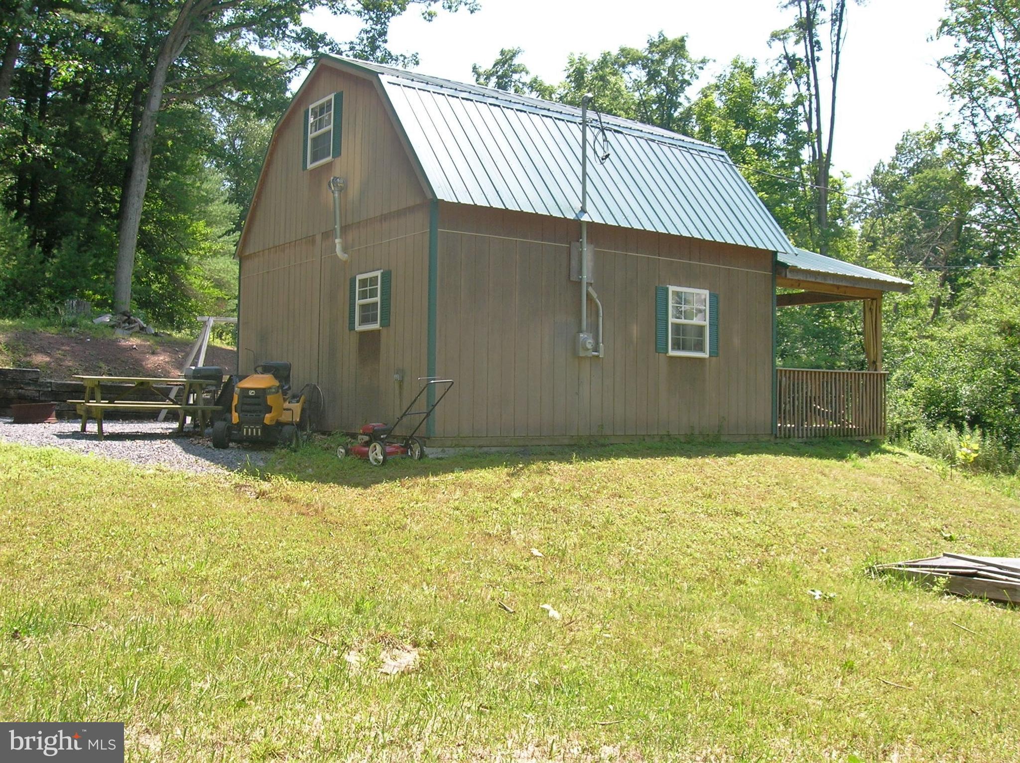 720 & 740 Ridge Rd Pa Blain, PA 17006 - Photo 4 of 18 side & back view of cabin