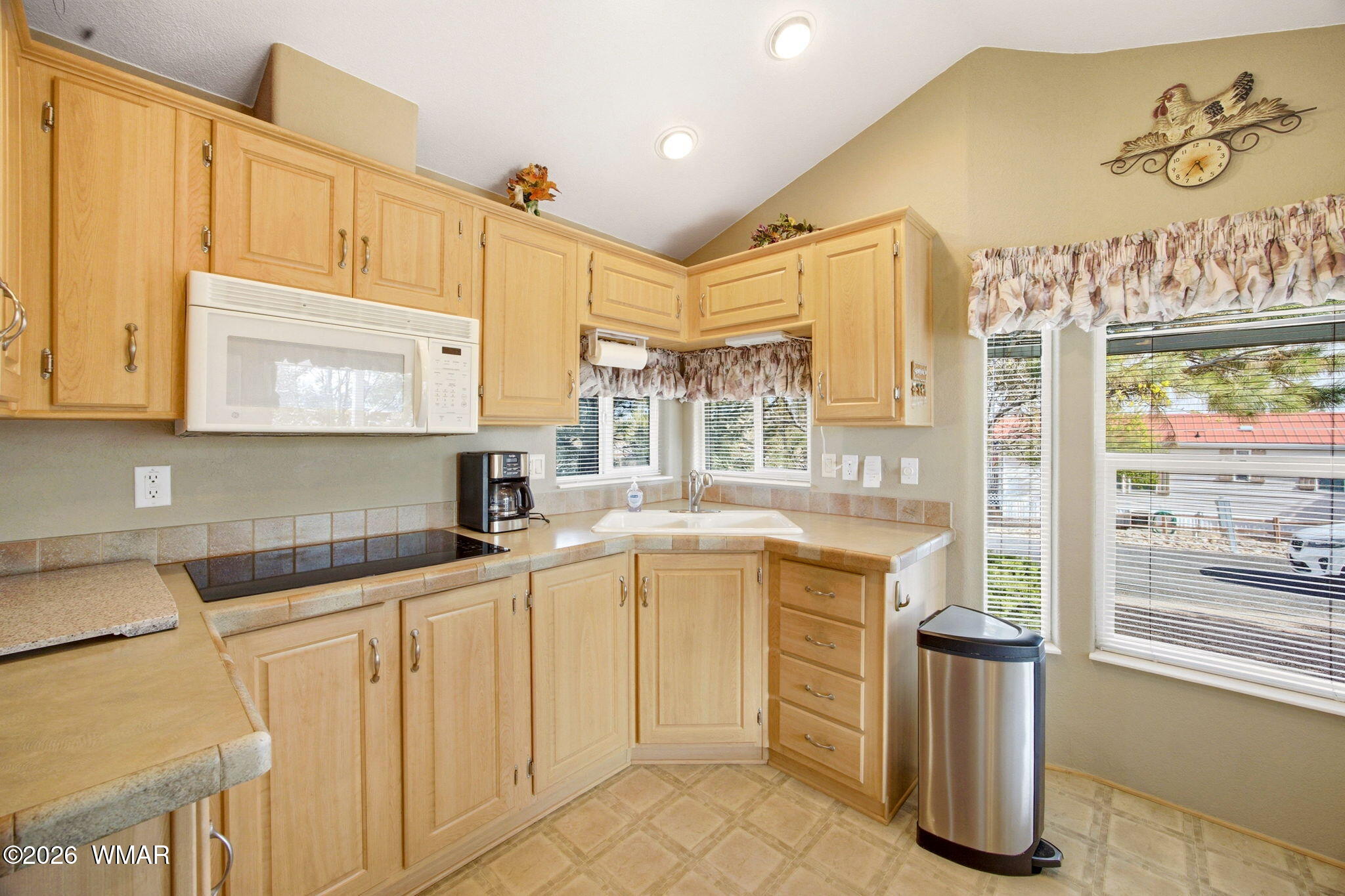 2275 Old Crooks Trail Overgaard, AZ 85933 - Photo 10 of 24 a kitchen with stainless steel appliances granite countertop a sink and cabinets