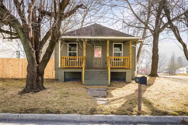 a view of a trees in front of a house