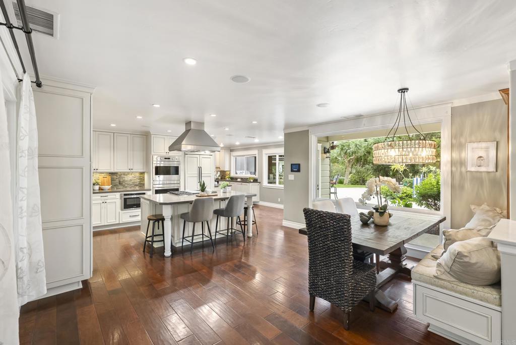 4847 Vita Road La Mesa, CA 91941 - Photo 15 of 73 a dining room with furniture window and wooden floor