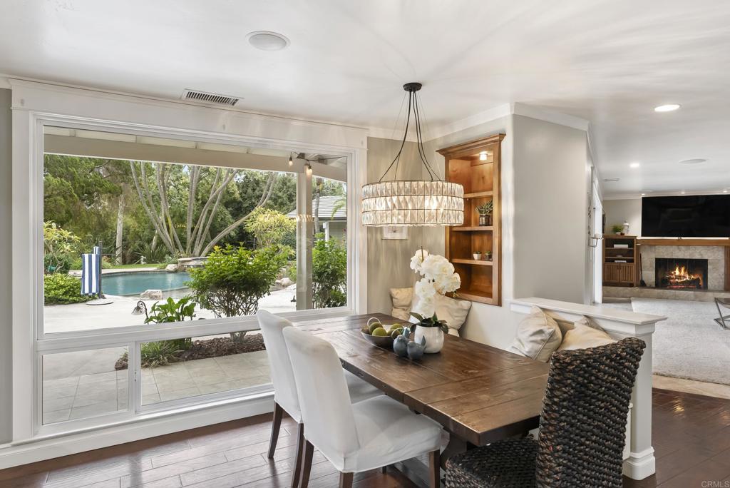 4847 Vita Road La Mesa, CA 91941 - Photo 17 of 73 a view of a dining room with furniture window and wooden floor