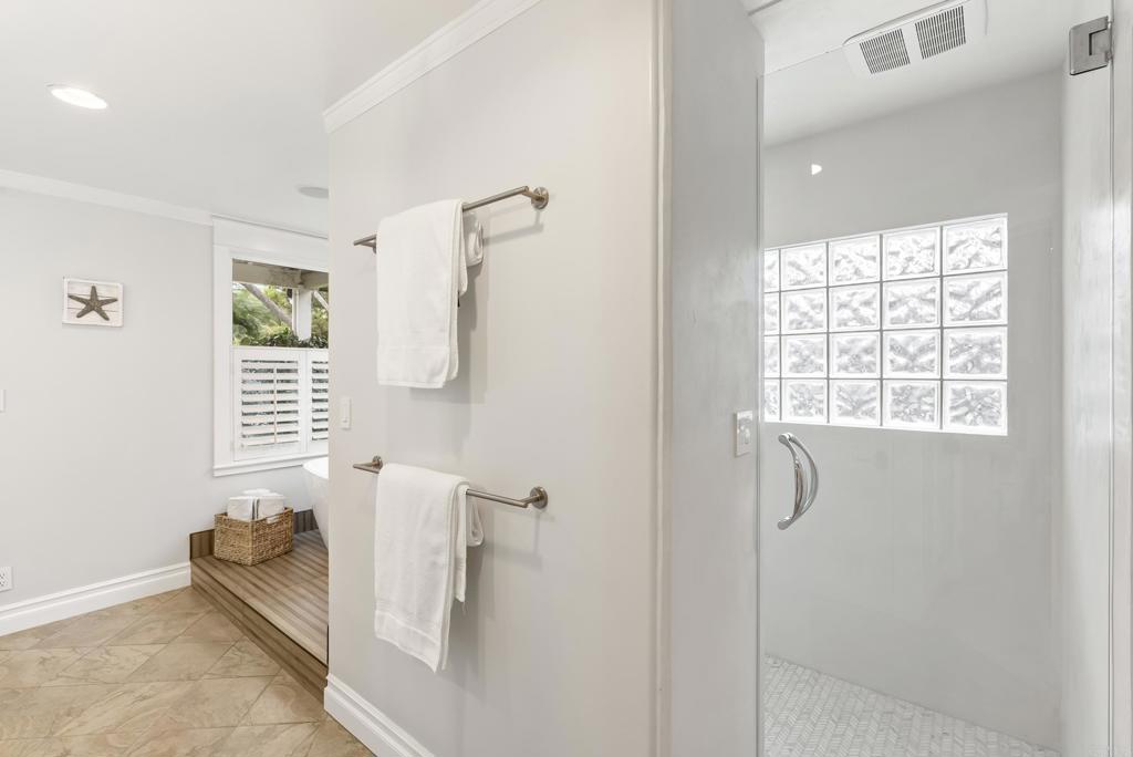 4847 Vita Road La Mesa, CA 91941 - Photo 31 of 73 a bath room with a window and a bath tub