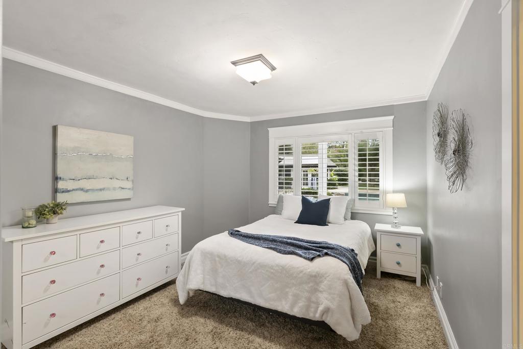 4847 Vita Road La Mesa, CA 91941 - Photo 34 of 73 a bedroom with a bed and a window