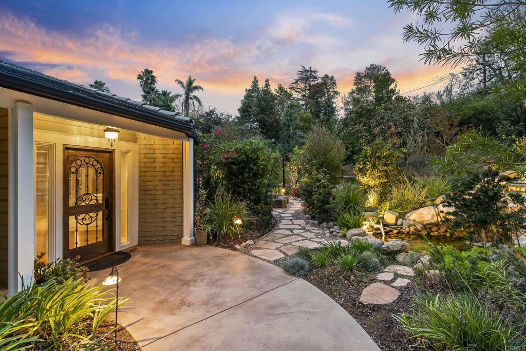 4847 Vita Road La Mesa, CA 91941 - Photo 5 of 73 a front view of a house with a yard