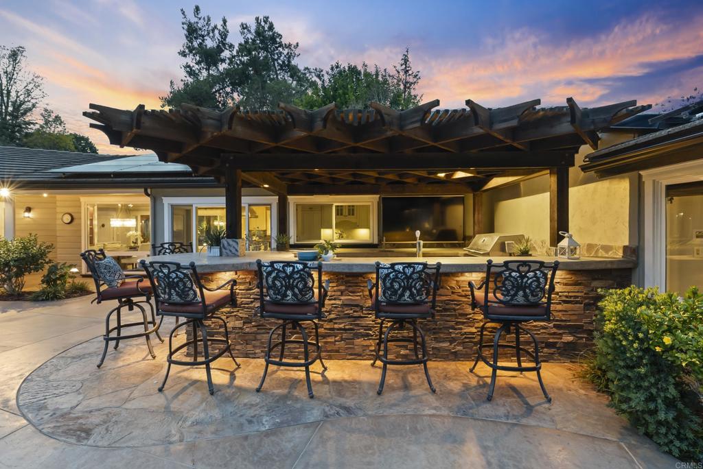4847 Vita Road La Mesa, CA 91941 - Photo 56 of 73 a view of a patio with table and chairs and potted plants
