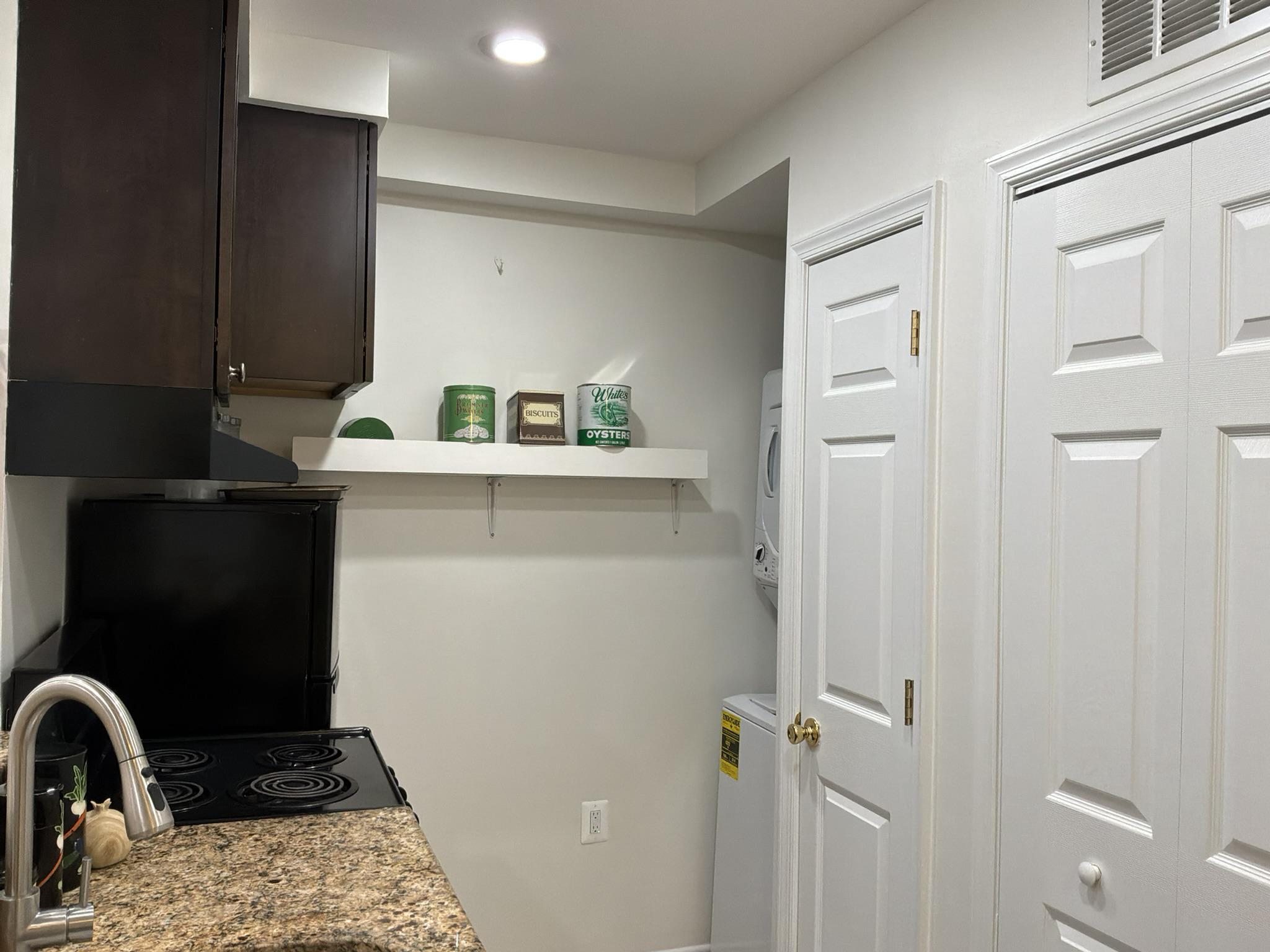 123 7th Street Northeast Washington, DC 20002 - Photo 4 of 7 Kitchen w/ oven, dishwasher, and washer/dryer.