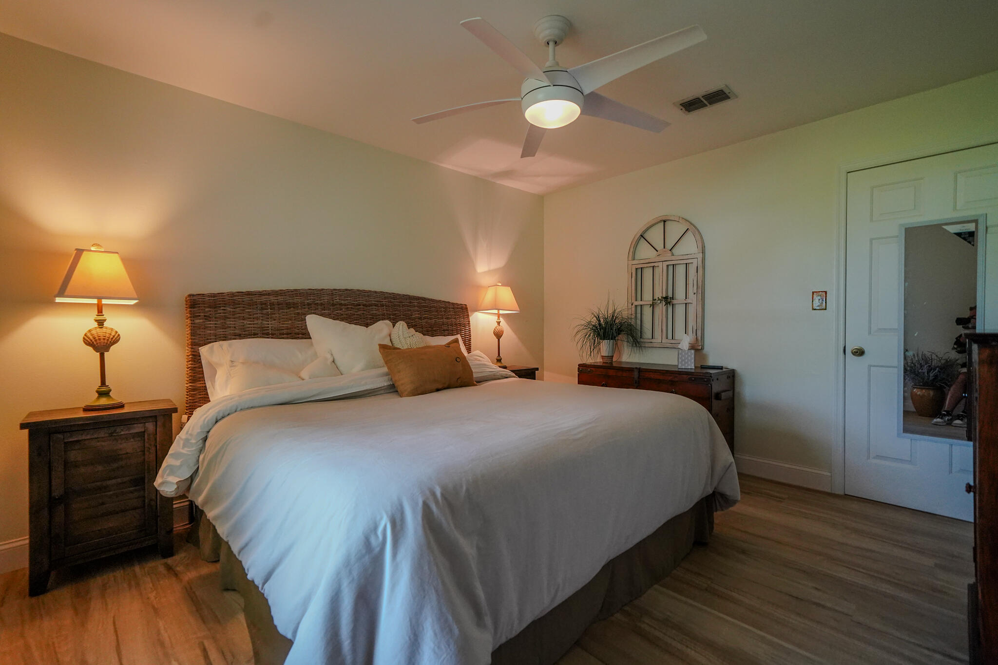 21 Corrine Place Key Largo, FL 33037 - Photo 16 of 46 a bedroom with a bed and wooden floor
