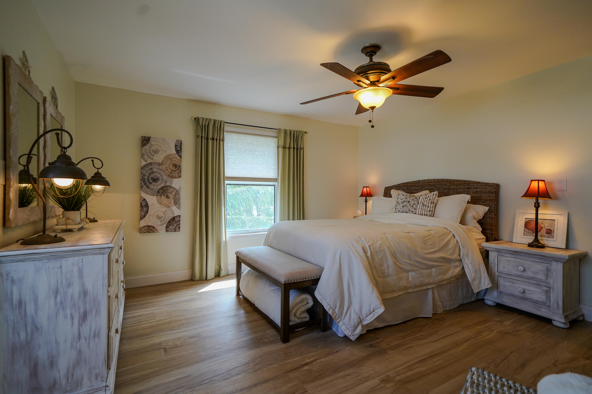 21 Corrine Place Key Largo, FL 33037 - Photo 18 of 46 a bedroom with a bed and a chandelier