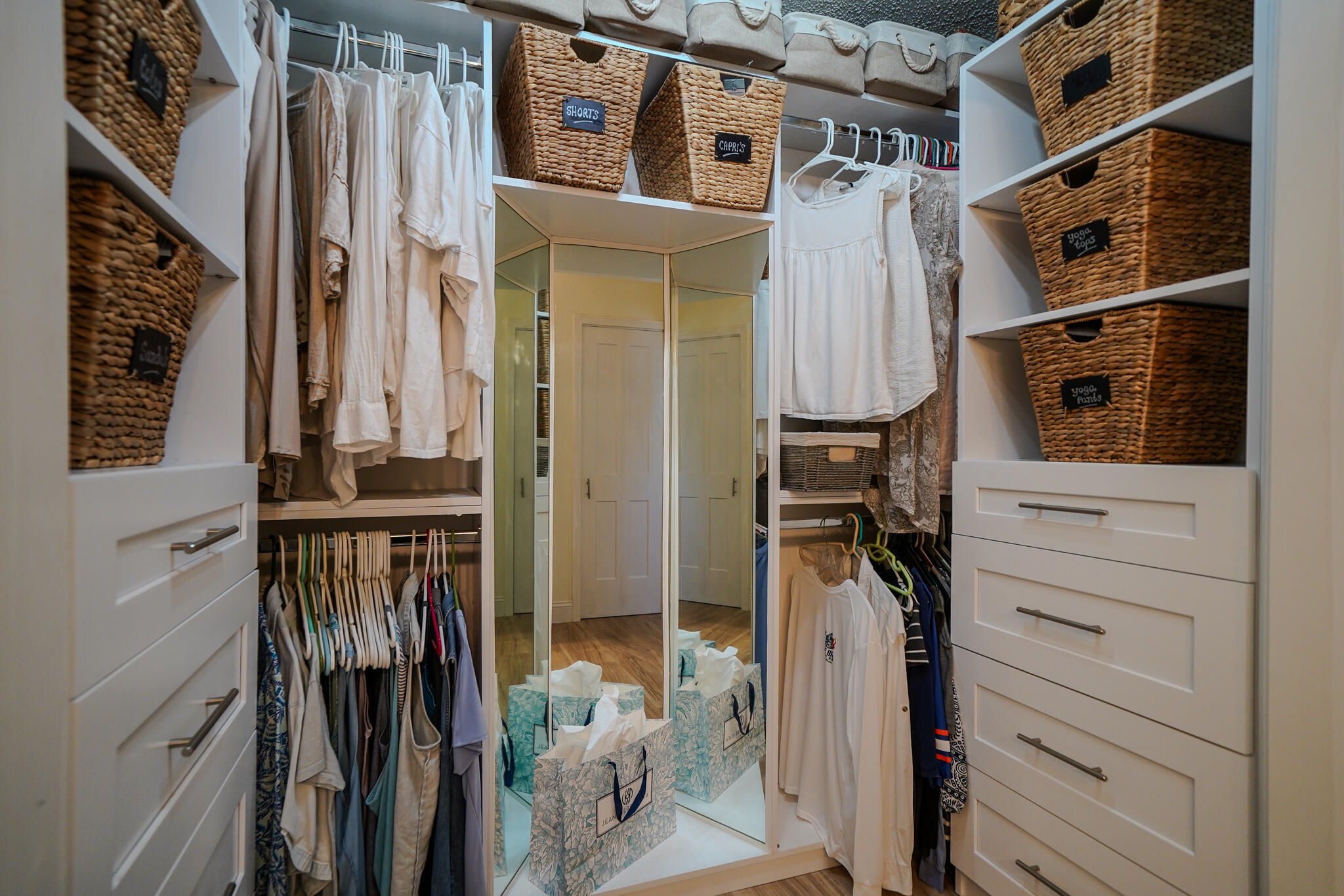 21 Corrine Place Key Largo, FL 33037 - Photo 21 of 46 a view of walk in closet with clothes and shoes