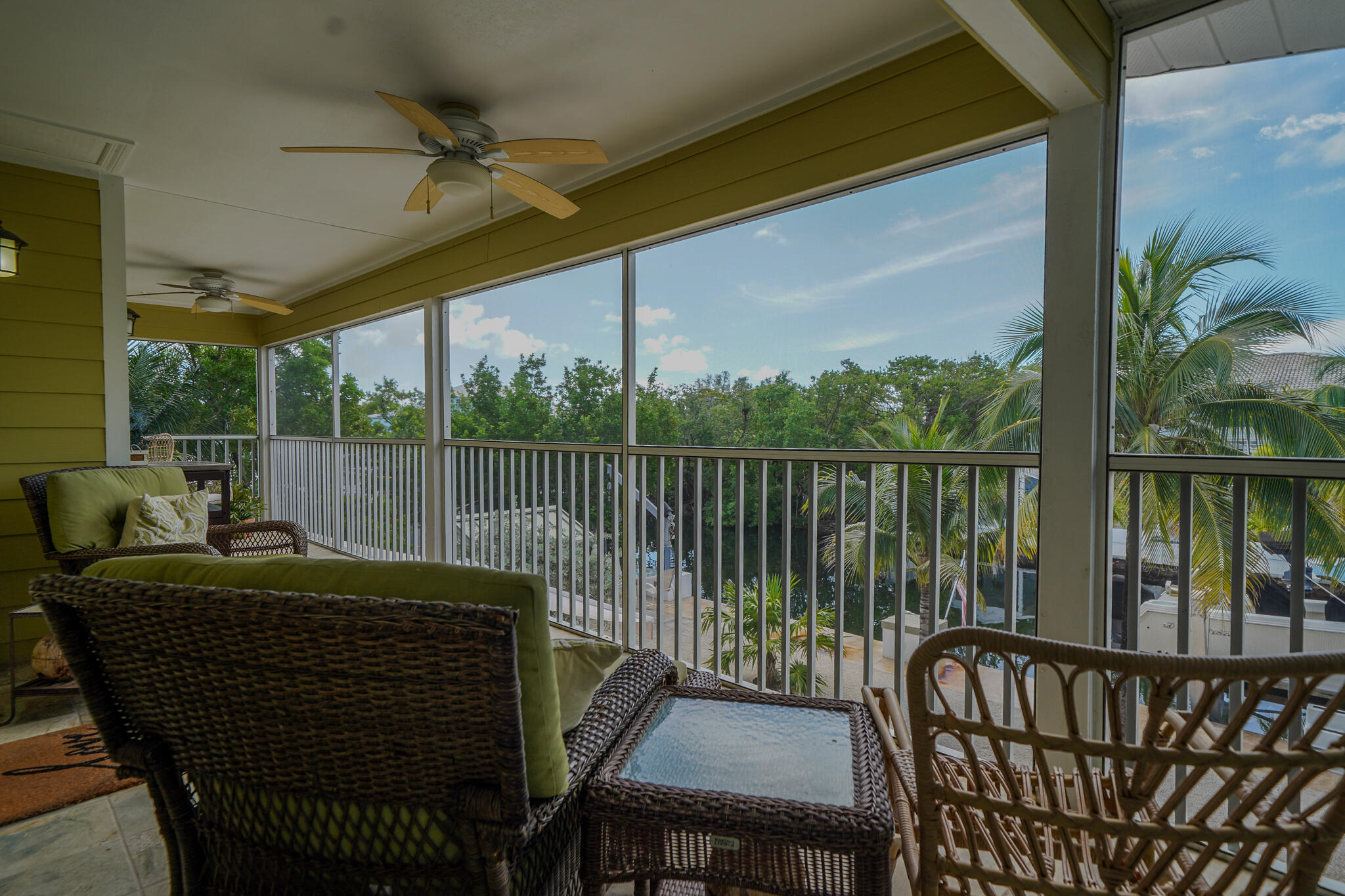 21 Corrine Place Key Largo, FL 33037 - Photo 27 of 46 a view of a balcony with furniture