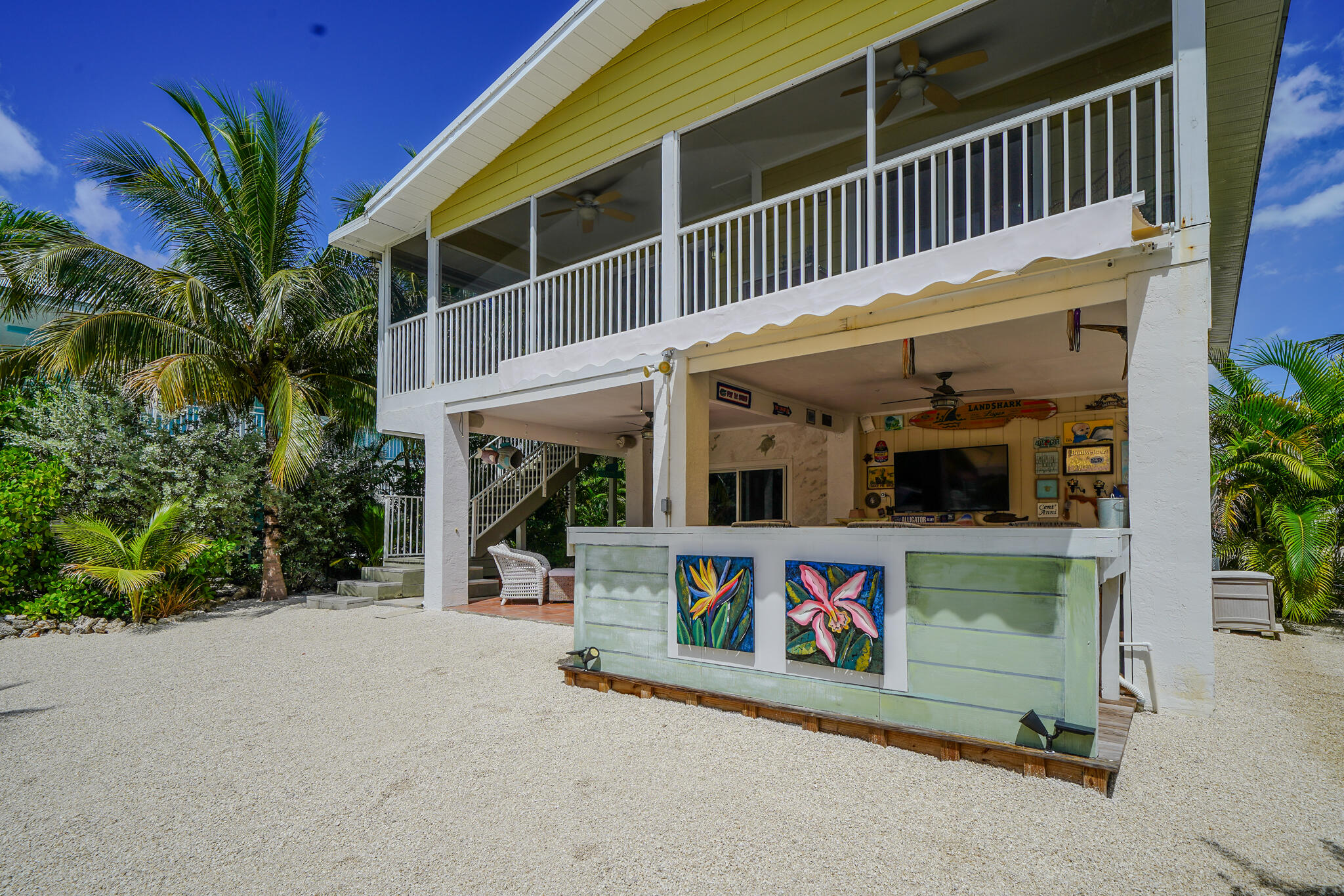 21 Corrine Place Key Largo, FL 33037 - Photo 34 of 46 a view of a street with potted plants