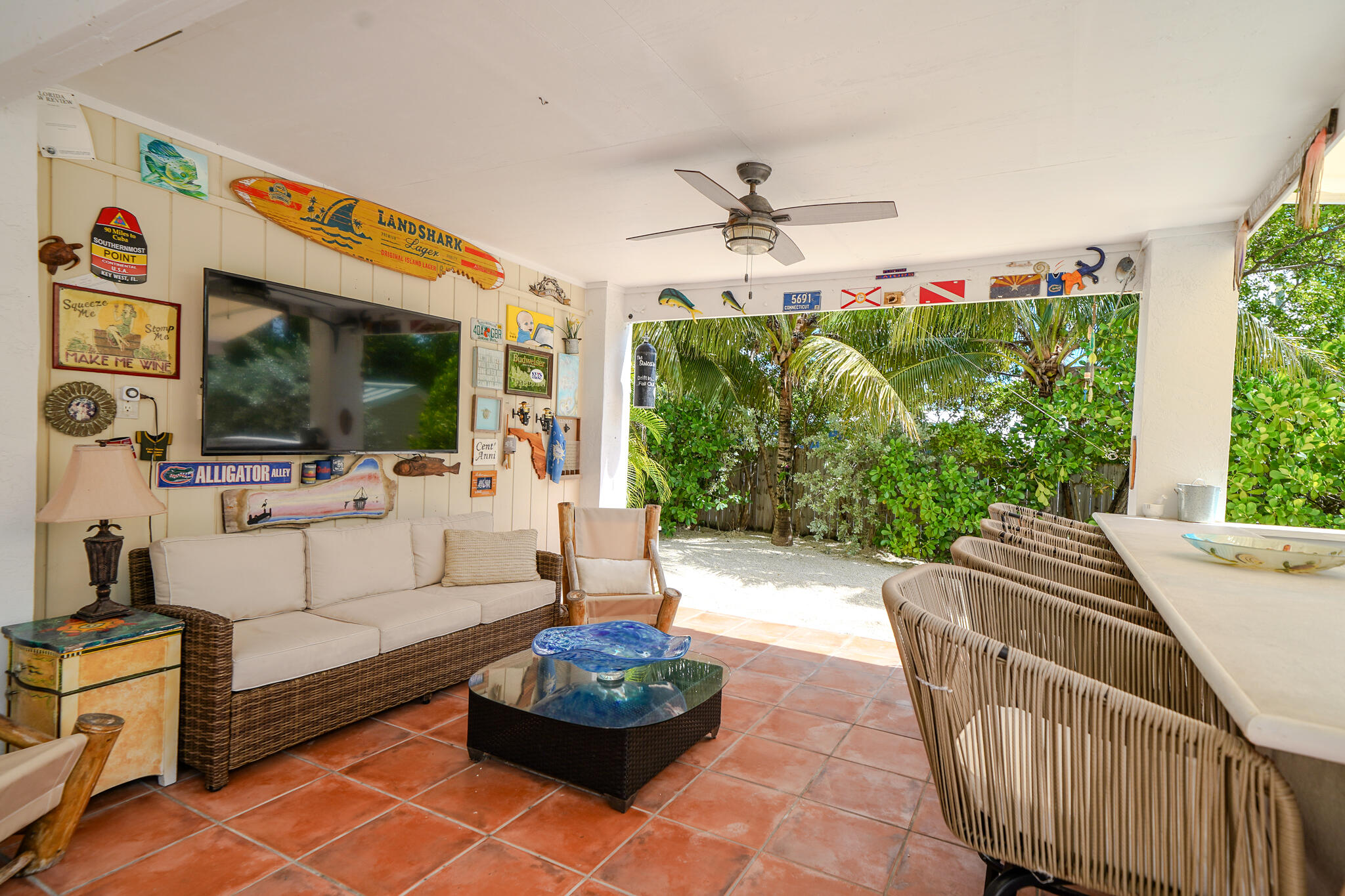 21 Corrine Place Key Largo, FL 33037 - Photo 36 of 46 a living room with furniture and a flat screen tv