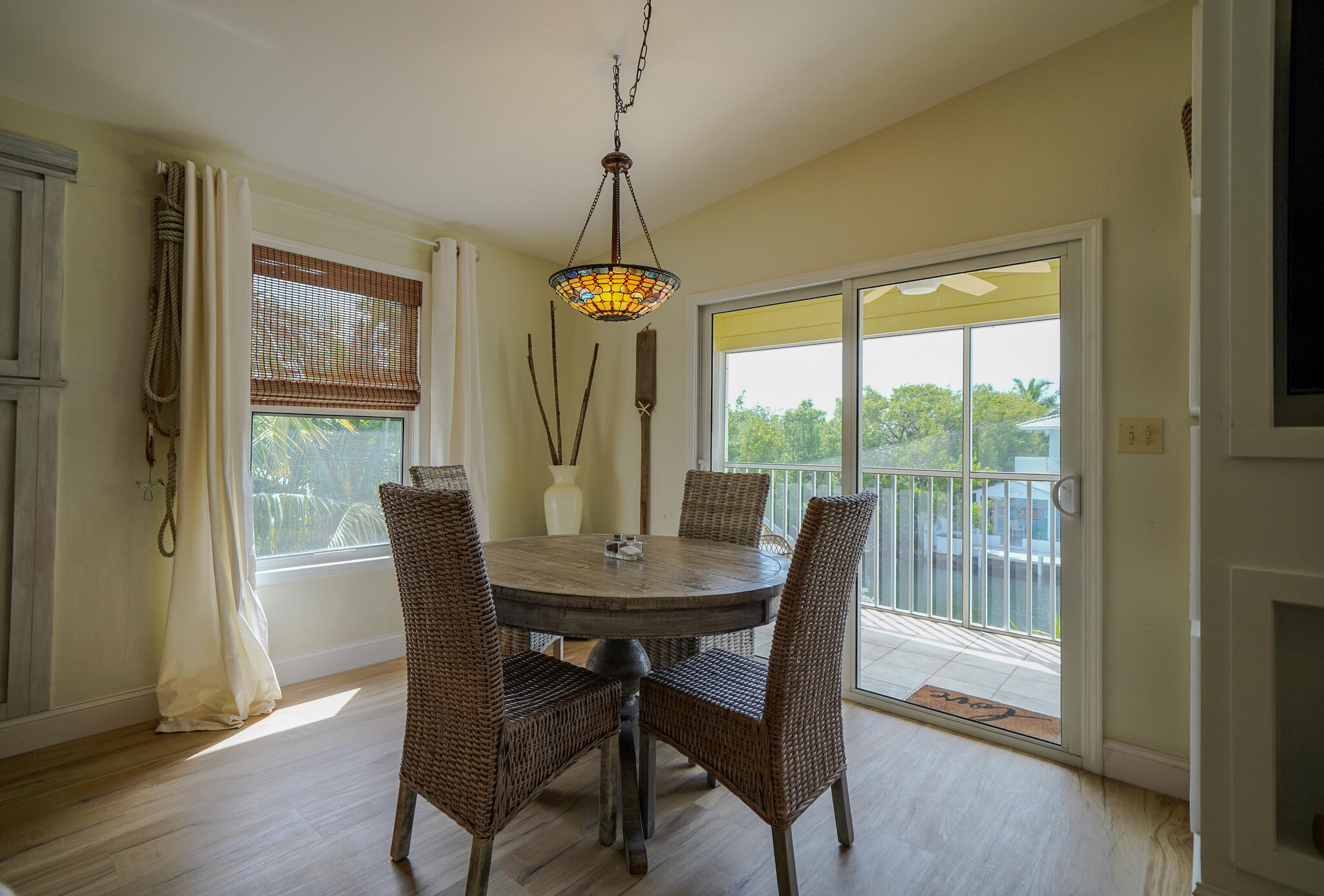 21 Corrine Place Key Largo, FL 33037 - Photo 4 of 46 a dining room with furniture window wooden floor