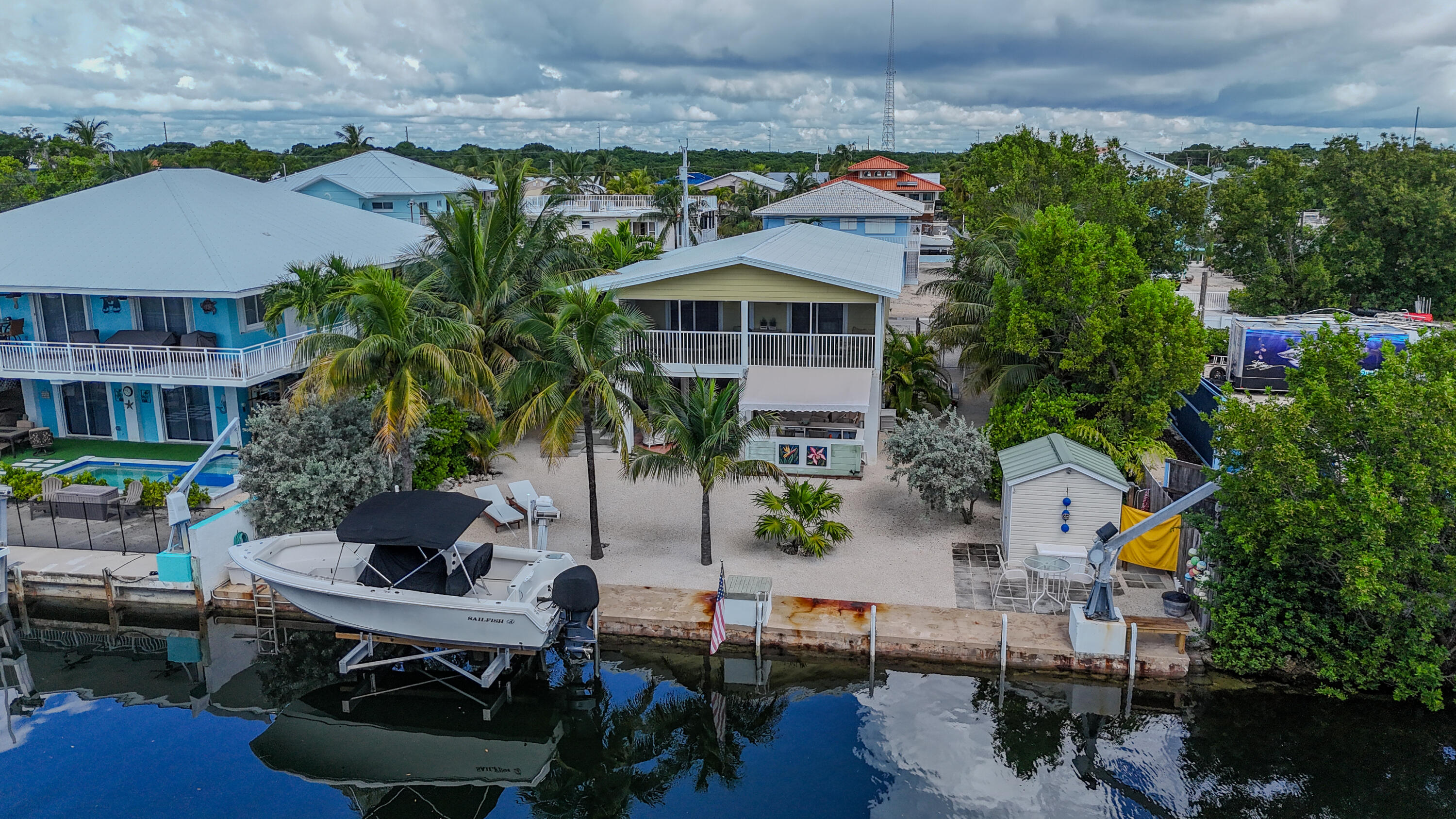 21 Corrine Place Key Largo, FL 33037 - Photo 43 of 46 an aerial view of a house with swimming pool and outdoor seating